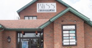 Exterior of the brick Bliss Marketplace building in downtown Willimantic.